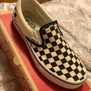 Black checkerboard slip ons